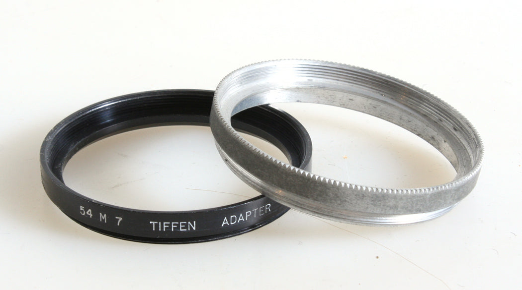 TIFFEN 54M7 THREAD TO SERIES VII 7 STEP-UP ADAPTER + RETAINER