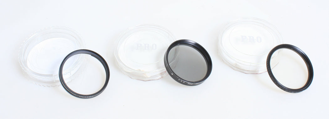 55MM FILTER SET OF 3 IN CASES POLARIZING, U.V., SPLIT FIELD