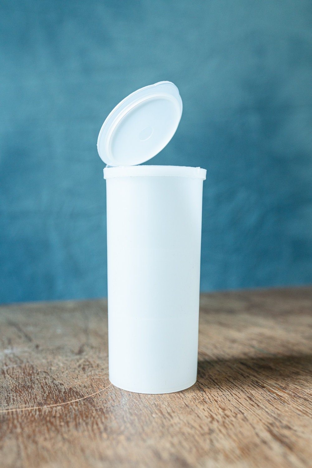 Plastic Container w/ a Hinged Pop On Lid