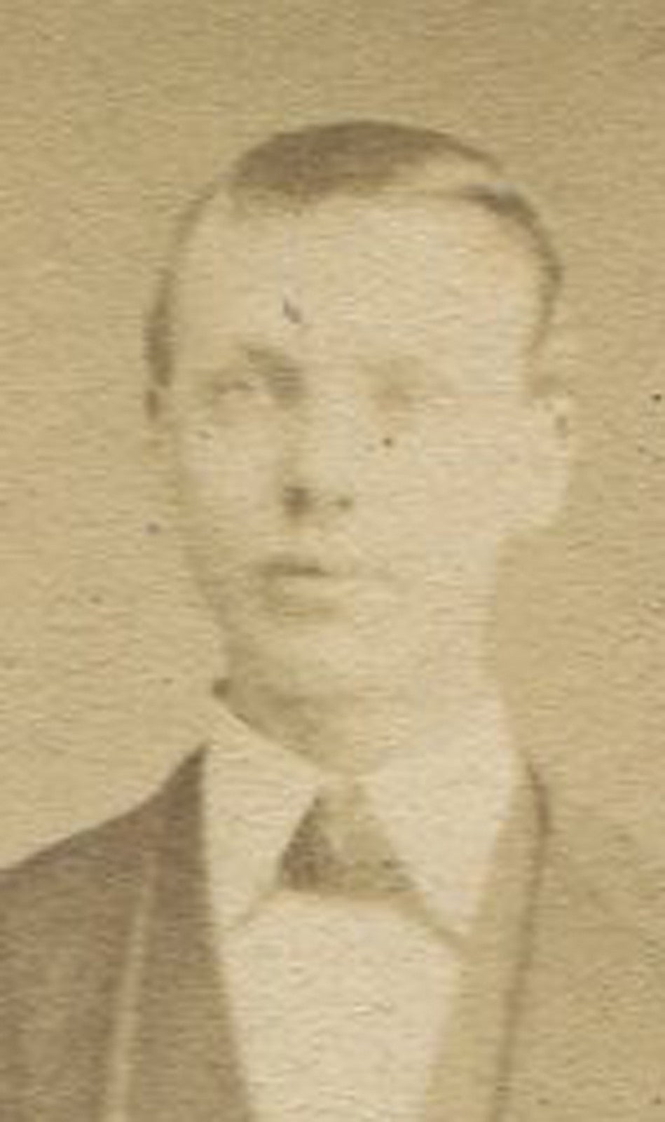 YOUNG MAN STANDING NEXT TO ORNATE CHAIR. CDV. PITTSBURGH, PA.