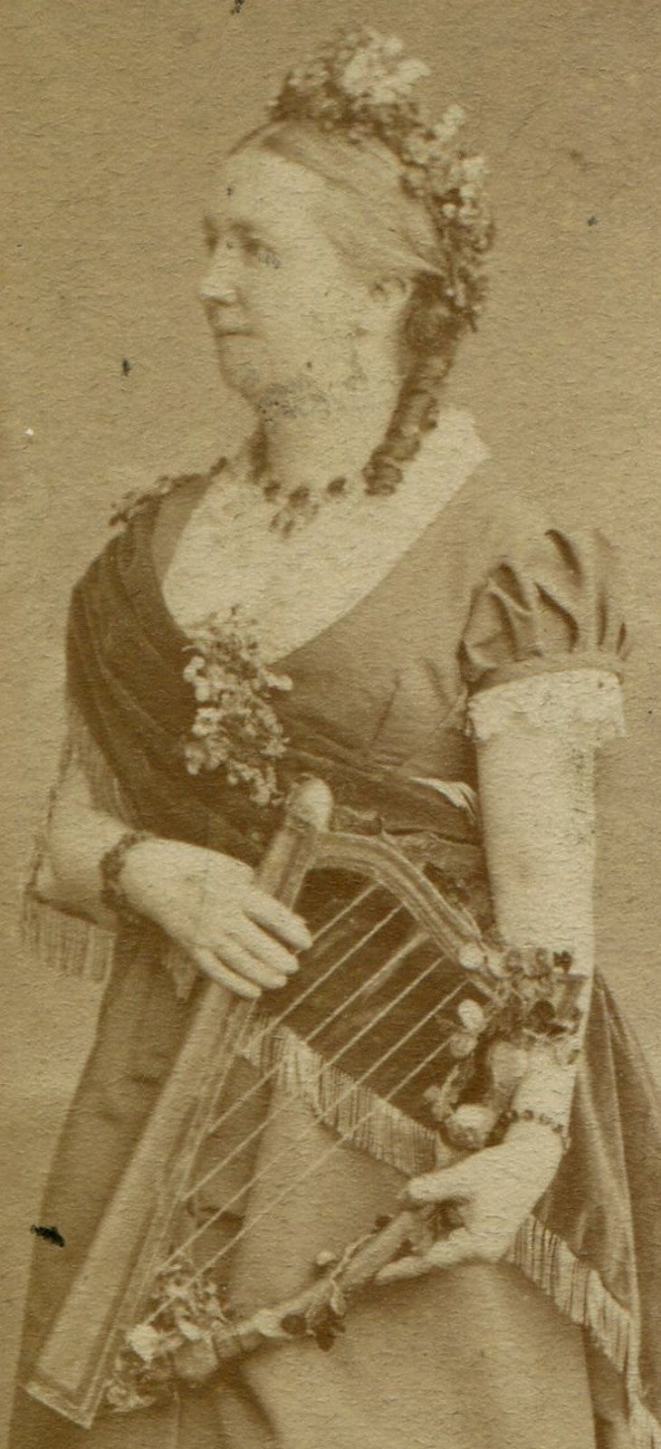 WOMAN ADORNED IN FLOWERS, HOLDING HARP. CDV. ENGLAND.