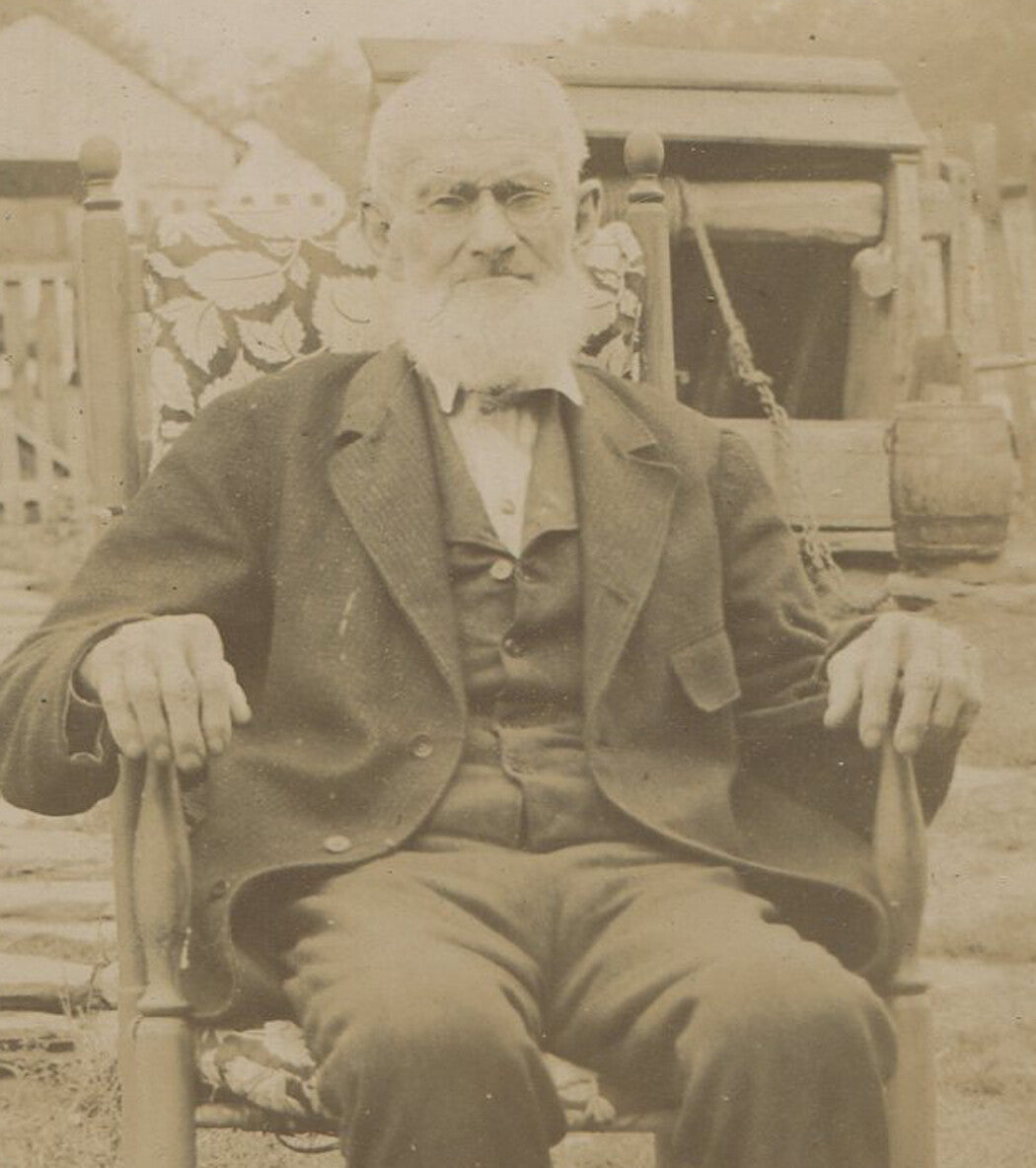 OLD MAN WITH LONG BEARD POSED ON CHAIN IN YARD. CABINET CARD CIRCA 1890.