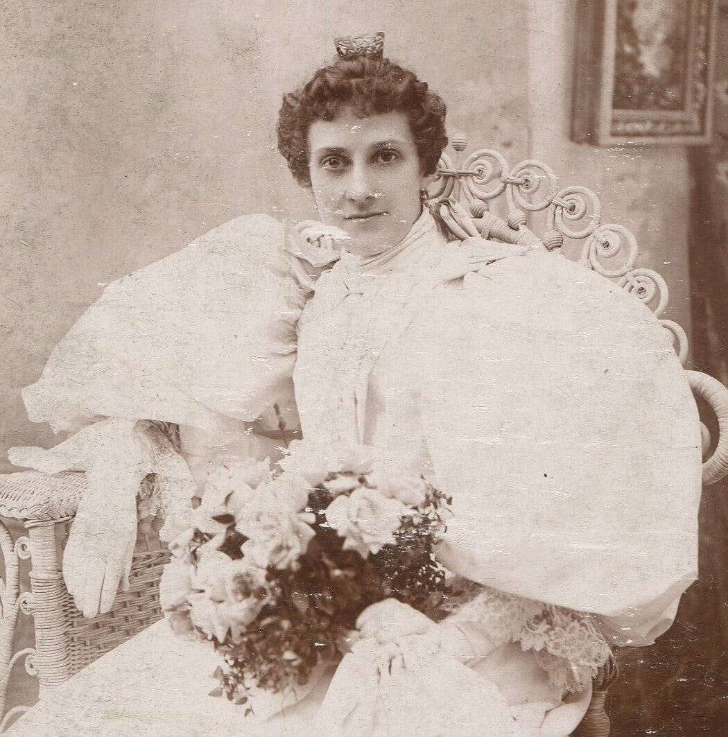 Vintage cabinet card portrait: Woman in dramatic poufy dress, itty-bitty crown,