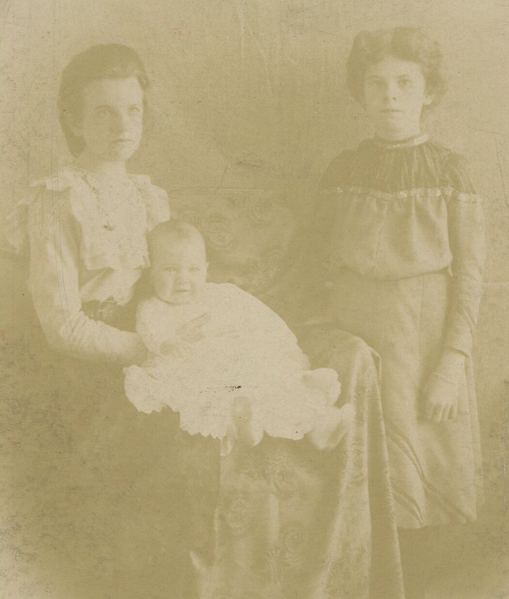 MOTHER WITH DAUGHTERS. THEY HAVE SOME VERY THICK HAIR. CABINET CARD.