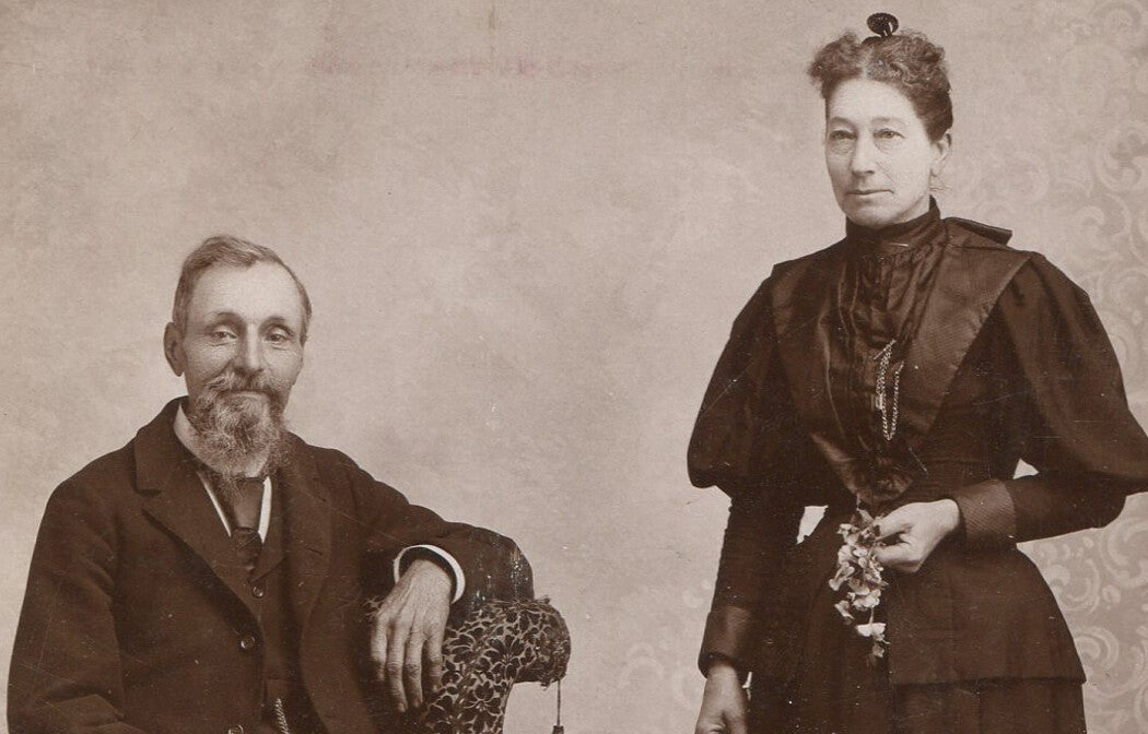 Vintage cabinet card portrait photograph of refined older couple, classic studio
