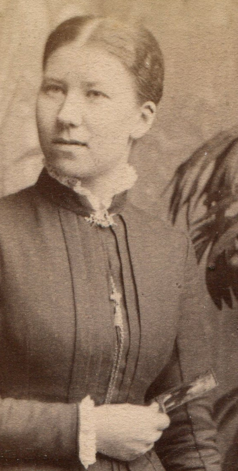 WOMAN, MYSTERY SMILE, HOLDING MYSTERY OBJECT. CDV. STOCKHOLM, SWEDEN.