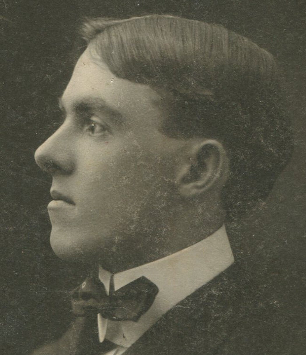 Vintage oval photo 5x3.5 in - Young man with high collar and bow tie dreaming of