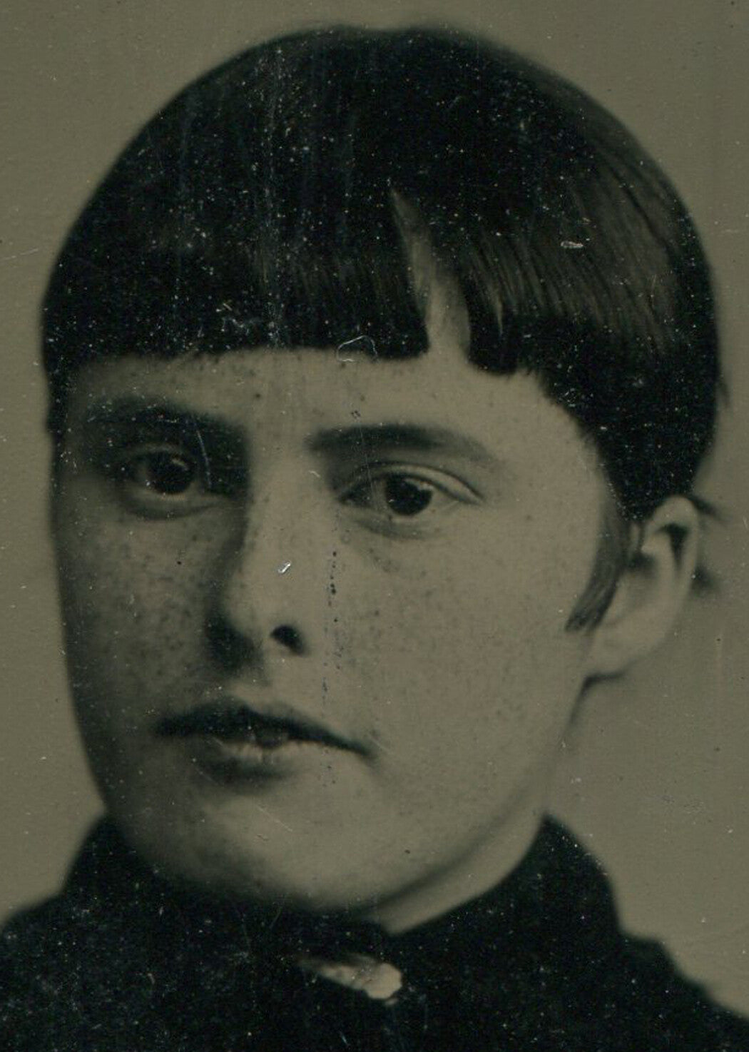 ROUND FACED, DARK EYED BEAUTY, STRAIGHT HAIR. TINTED TINTYPE.