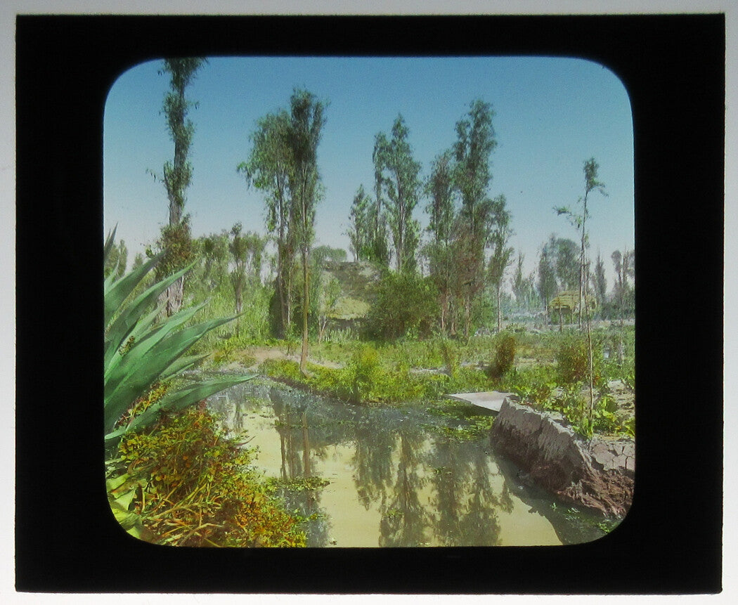CHINAMPAS GARDENS, MEXICO. PHOTO ON GLASS, HAND COLORED.