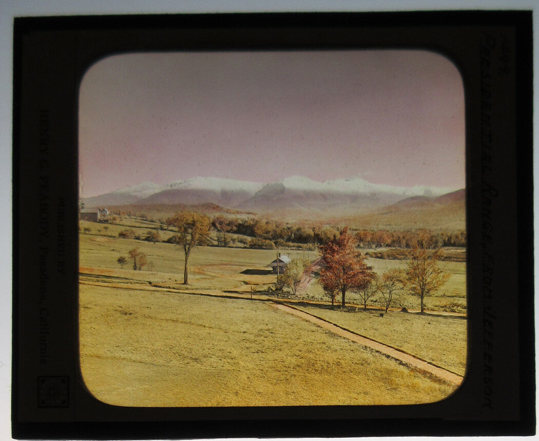 SNOW CAPPED MOUNTAINS, PLANES IN FOREGROUND. PHOTO ON GLASS, HAND COLORED.