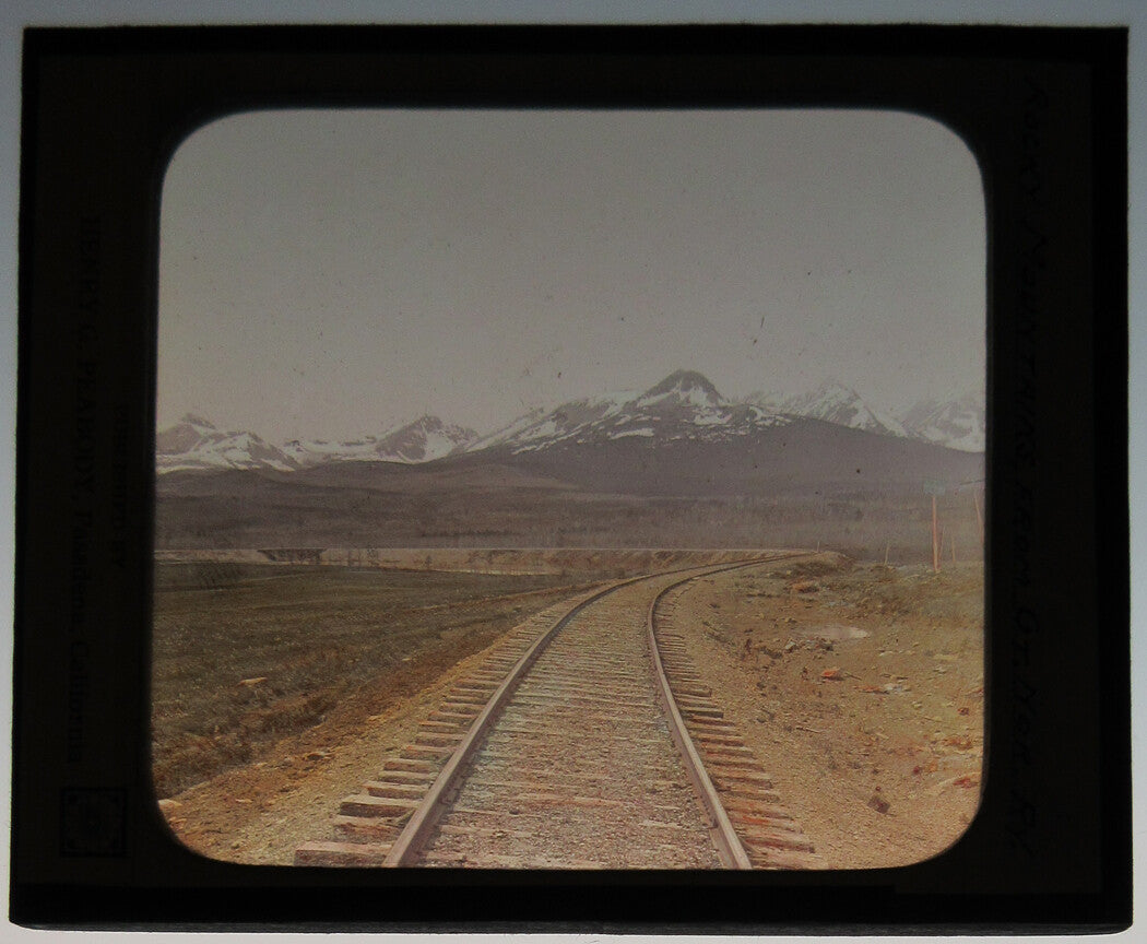 RAILROAD TRACKS, GREAT NORTH RAILWAY. PHOTO ON GLASS, HAND COLORED.