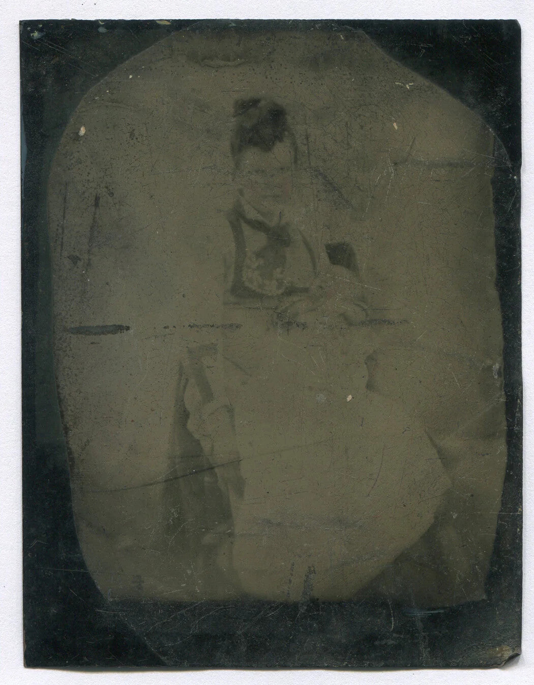 GHOSTLY LOOKING WOMAN. TINTYPE.