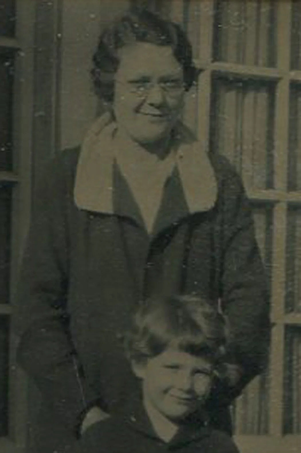 MOTHER AND DAUGHTER POSED IN SUNSHINE. TINTYPE IN PERIOD PAPER MAT.