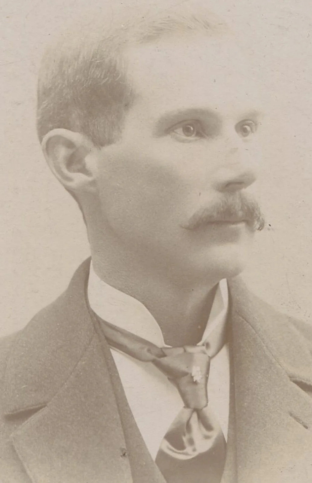 MAN W/HIGH CHEEKBONES, MUSTACHE. CABINET CARD. DELAWARE, OHIO.
