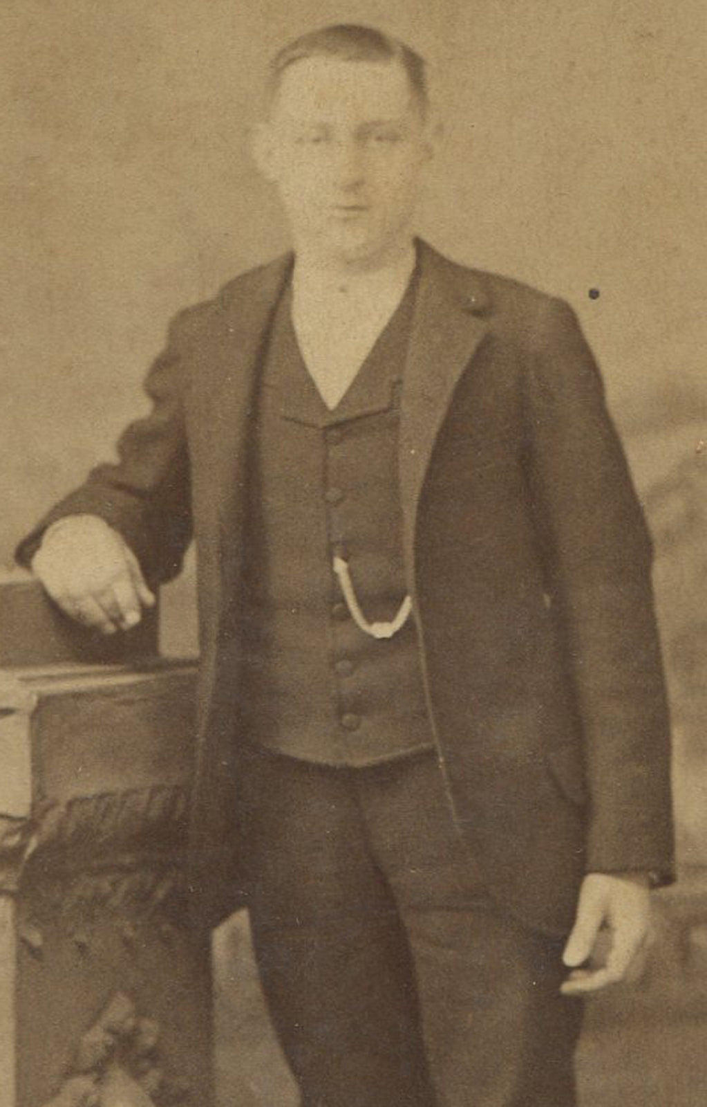 LONG ARMED MAN, STANDING POSE. CABINET CARD.