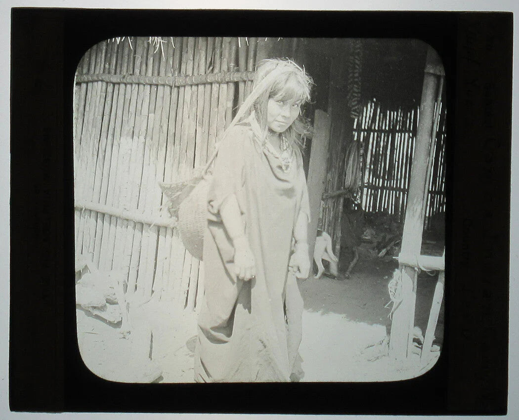 YOUNG INDIGENOUS WOMAN CARRYING YUCCA. PERU. PHOTO ON GLASS.