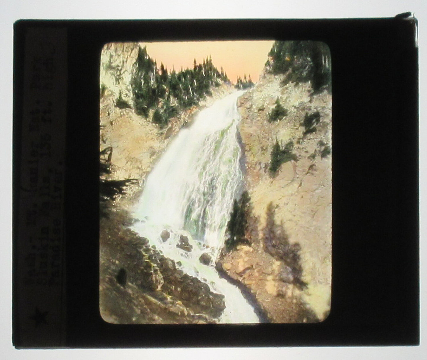SLUISKIN FALLS. HAND COLORED PHOTO ON GLASS. TINTED LANTERN SLIDE.