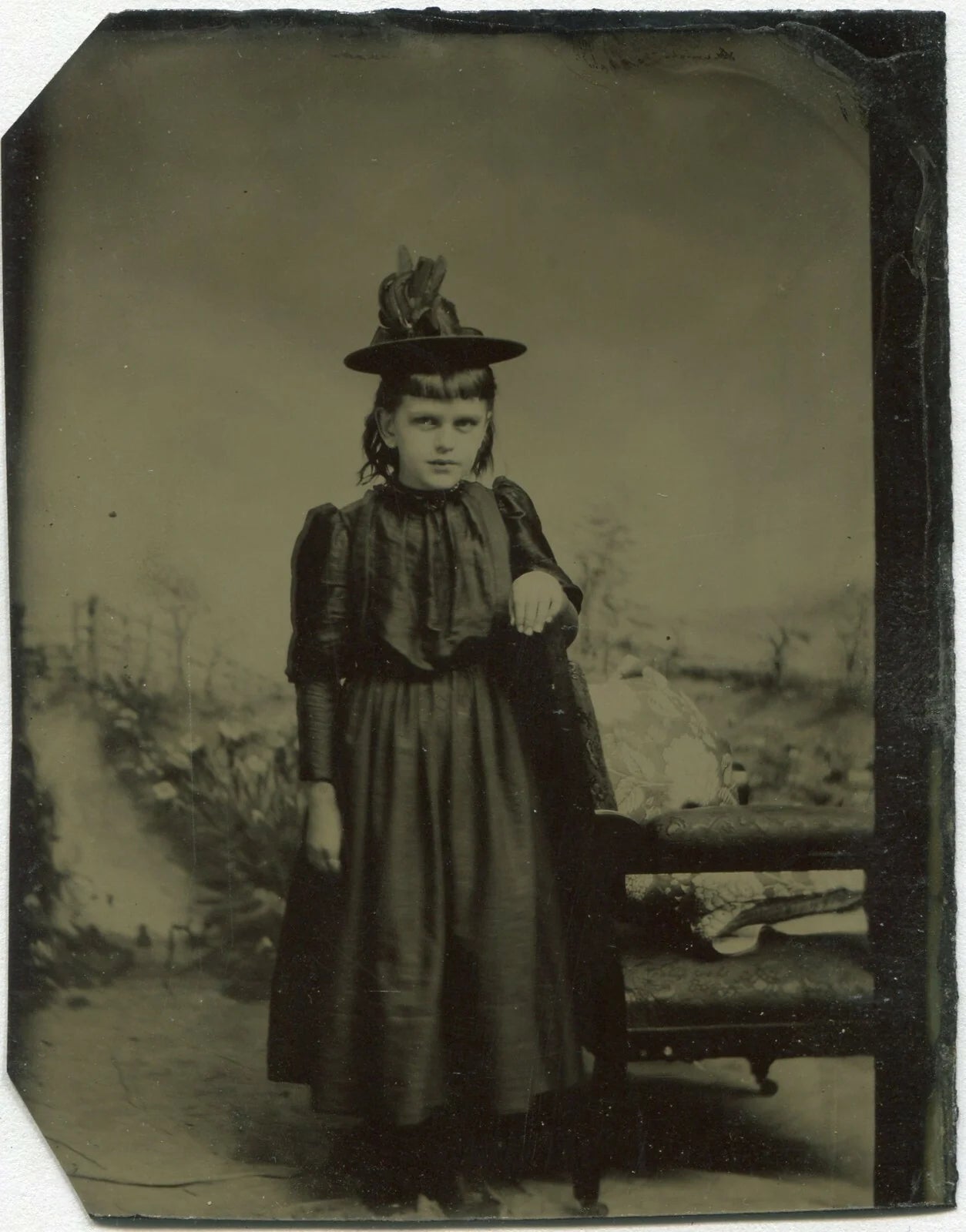 YOUNG GIRL, SPOOKY WITCH APPRENTICE. DEAD BIRD HAT. TINTYPE.