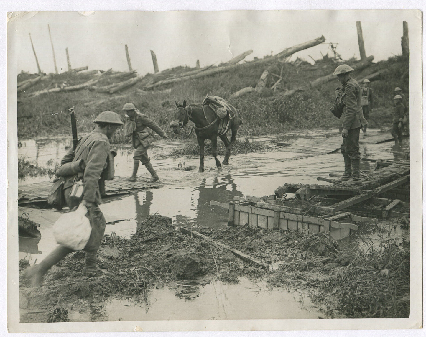 Vintage WWI 8x10 Photo Reprint - British Troops Navigating Mud on the Western