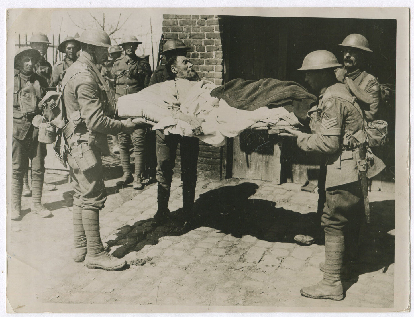 Vintage World War I Photo 8x10 Reprint: Elderly Man Rescued from Bombed Village