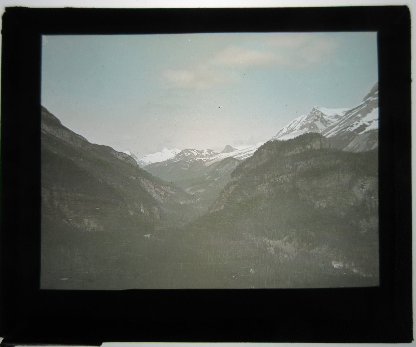 SNOW CAPPED MOUNTAINS. HAND TINTED LANTERN SLIDE.