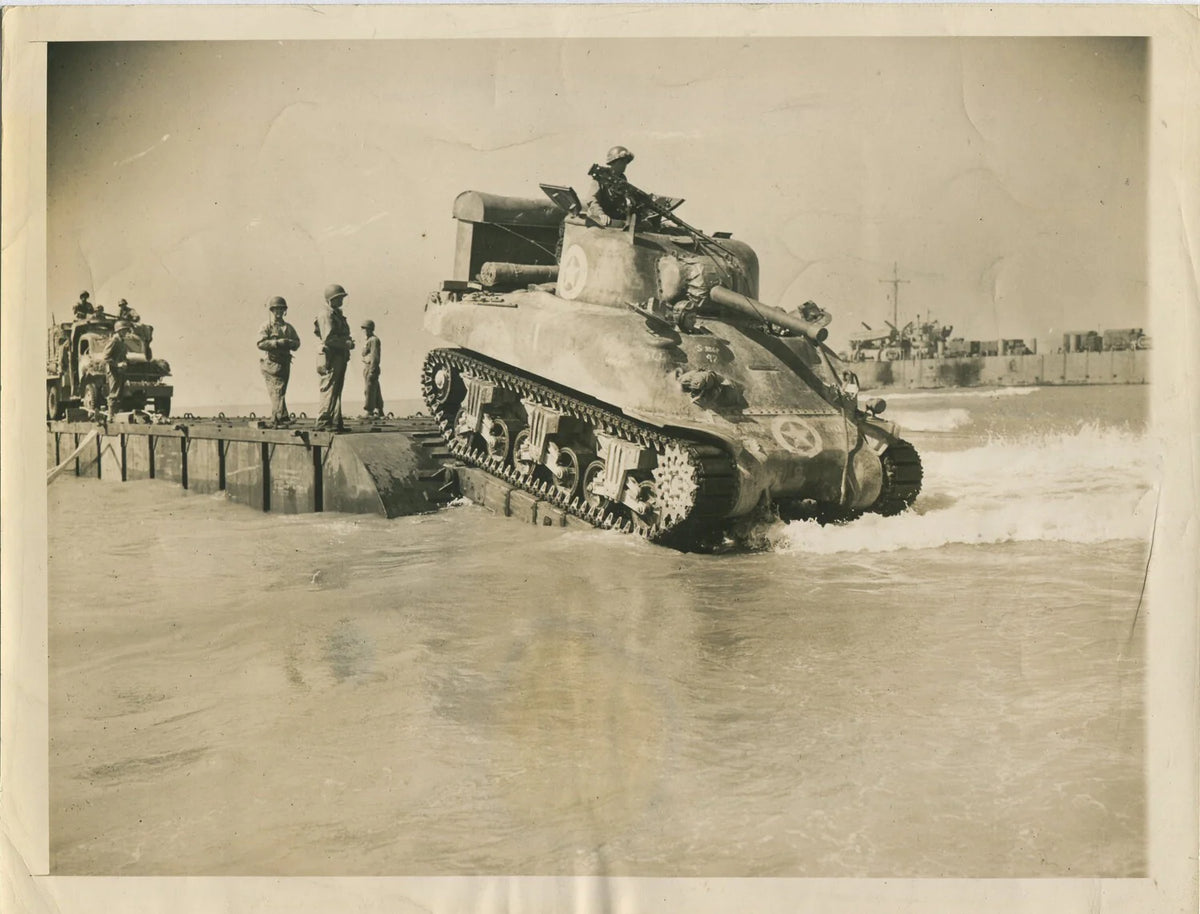 TANK ROLLS OFF LANDING CRAFT. SICILY, ITALY. WWII. (8X10 REPRINT)