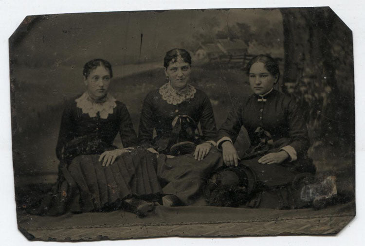TINTYPE THREE WOMEN COMFORTABLE POSE, PAINTED BACKDROP.