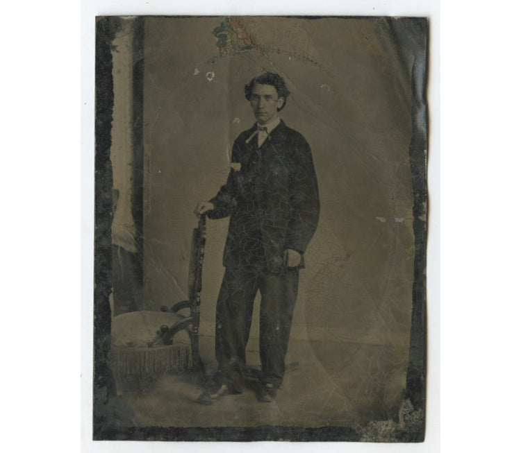 LARGE TINTYPE - STUDIO PORTRAIT OF YOUNG MAN IN SUIT STANDING