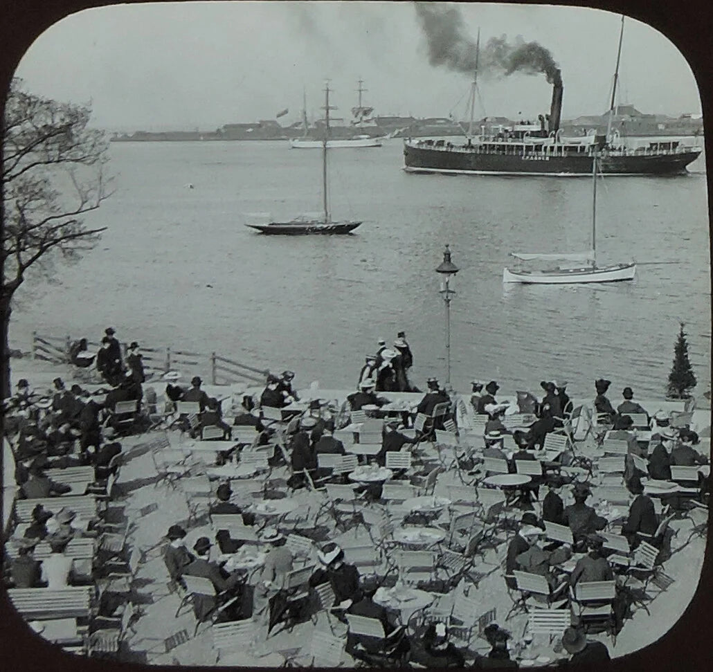 PEOPLE SITTING AT TABLES + BUSY HARBOR W/ CPA KOCH SHIP, ANTIQUE PHOTO ON GLASS
