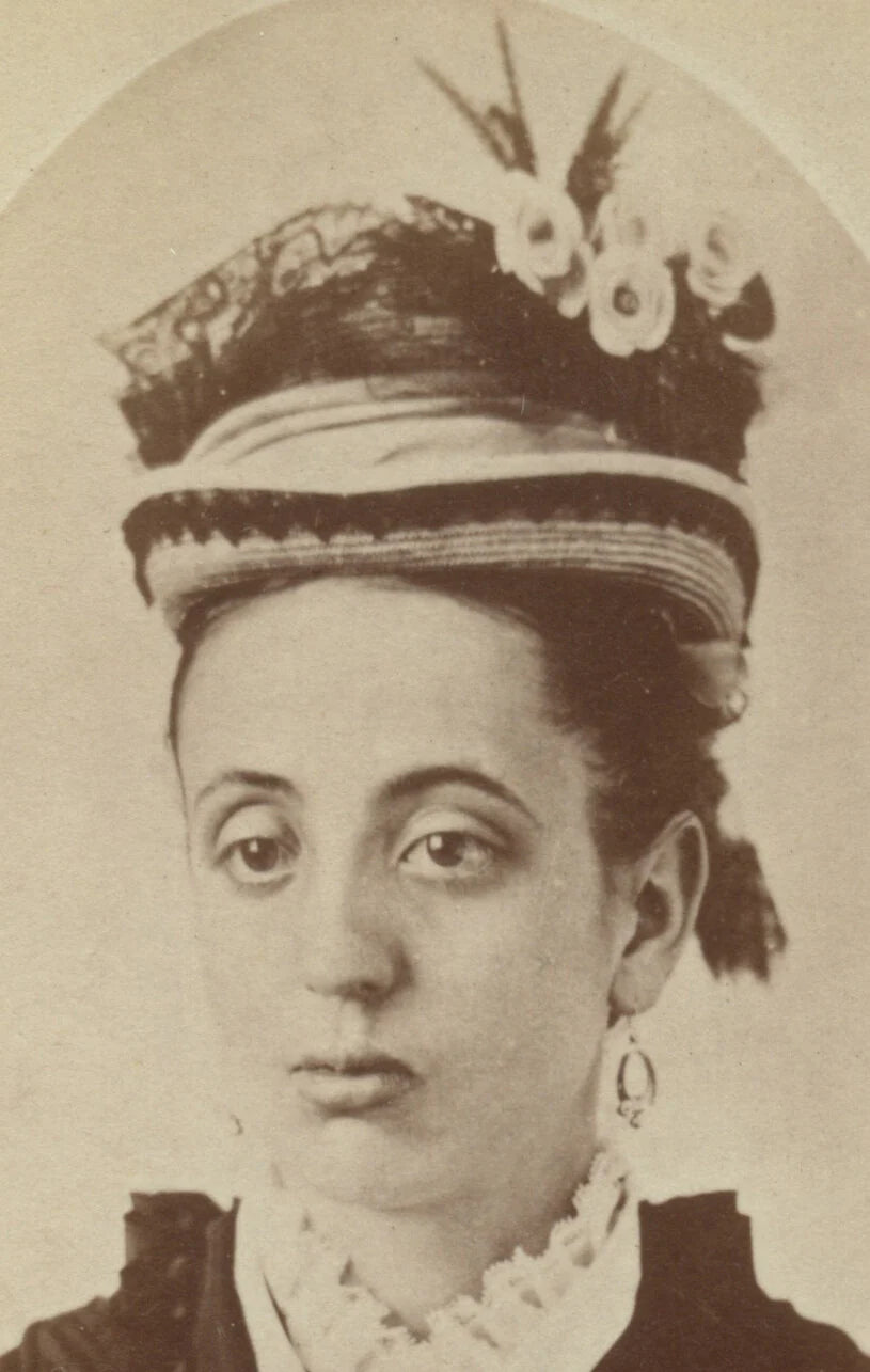 TROY, NY, PHOTO OF LADY, GREAT HAT + STOIC EYES