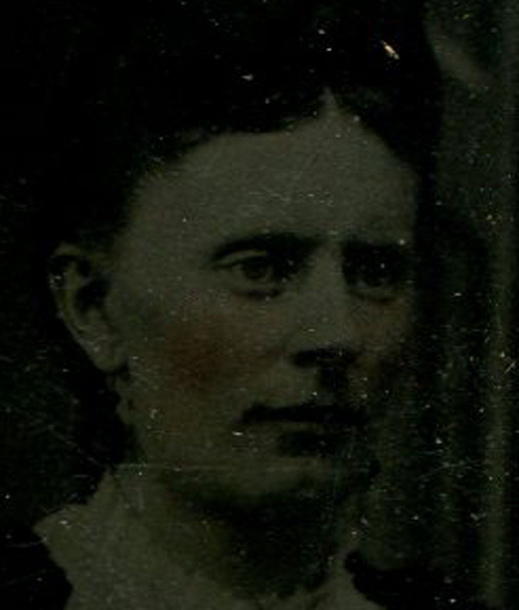 GLUM LOOKING WOMAN POSED AT WINDOW. TINTED TINTYPE.