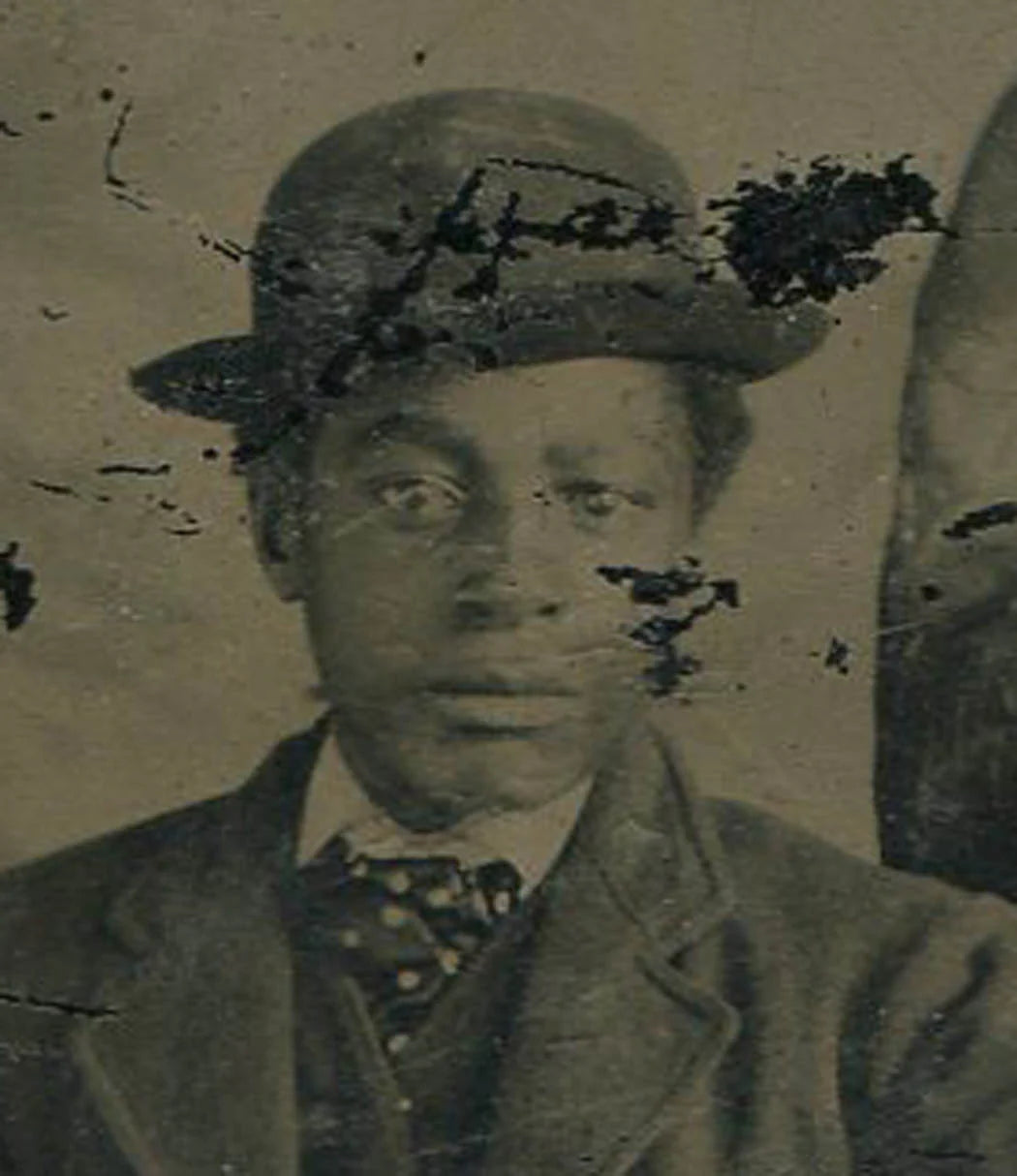 YOUNG AFRICAN AMERICAN MAN, WEARING SUIT, HAT, POLKA DOT TIE. TINTYPE.