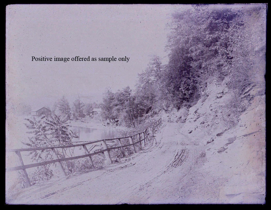 COUNTRY LANE WITH FENCE NEXT TO POND. GLASS PLATE NEGATIVE, 6.5 X 8.5 INCHES.