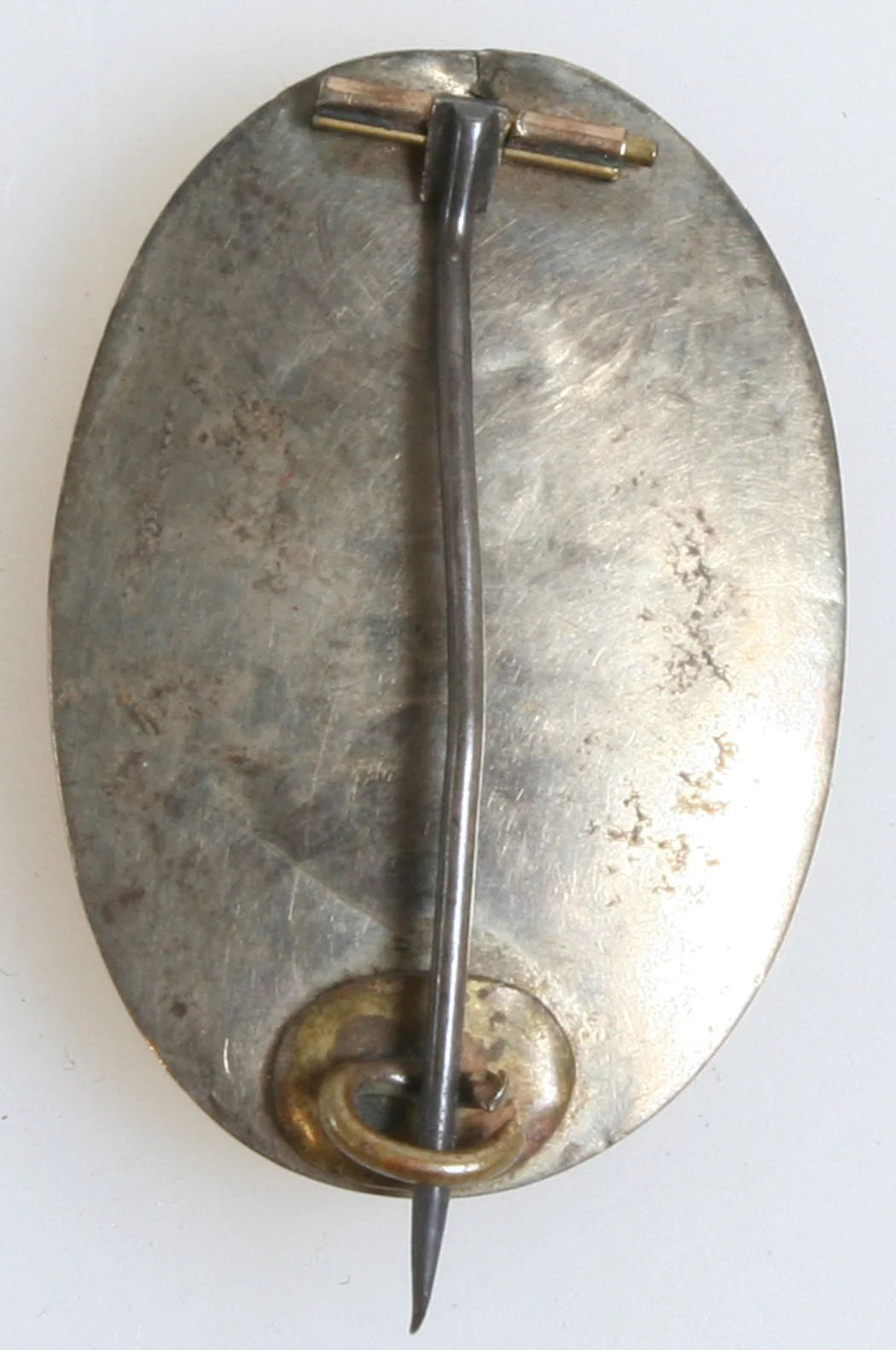 Pin, Jewelry, Tintype. Man With Short Pompadour. Gold Pin. 1860s.