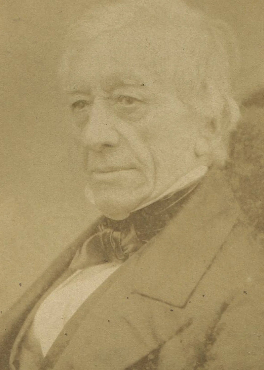 UNKNOWN MAN HOLDING PENCIL. ALBUMEN PRINT BY MAULL AND POLYBLANK.
