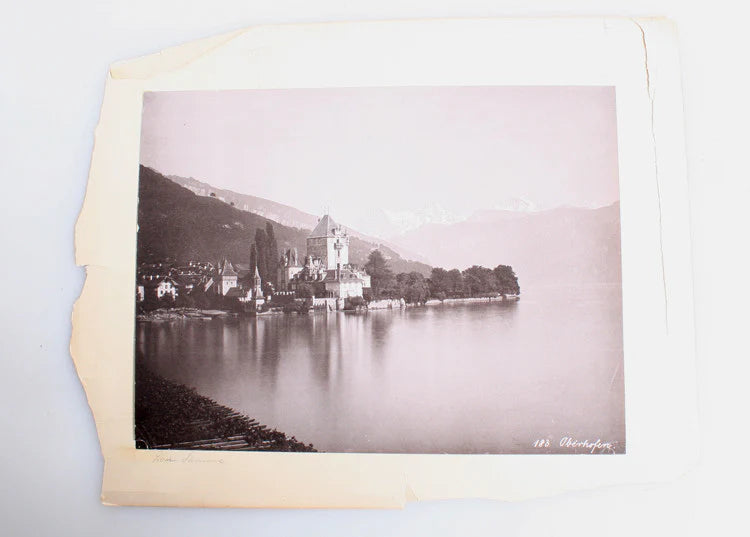8X10 PHOTO OF MANSON ON LAKE W/ ALPS IN THE BACKGROUND - LUCERNE, FRANCE