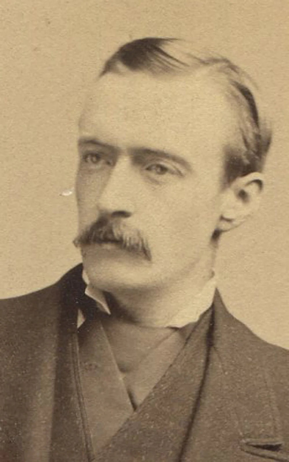 VERY HANDSOME MAN HOLDING HAT. TACK SHARP ALBUMEN IN MAT.