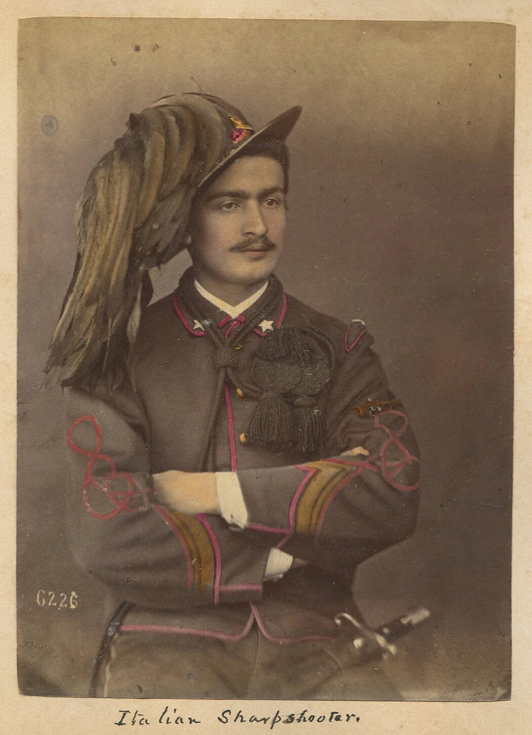 ITALIAN SHARPSHOOTER IN UNIFORM. BEAUTIFULLY TINTED ALBUMEN. 5.75X4 INCHES.1860