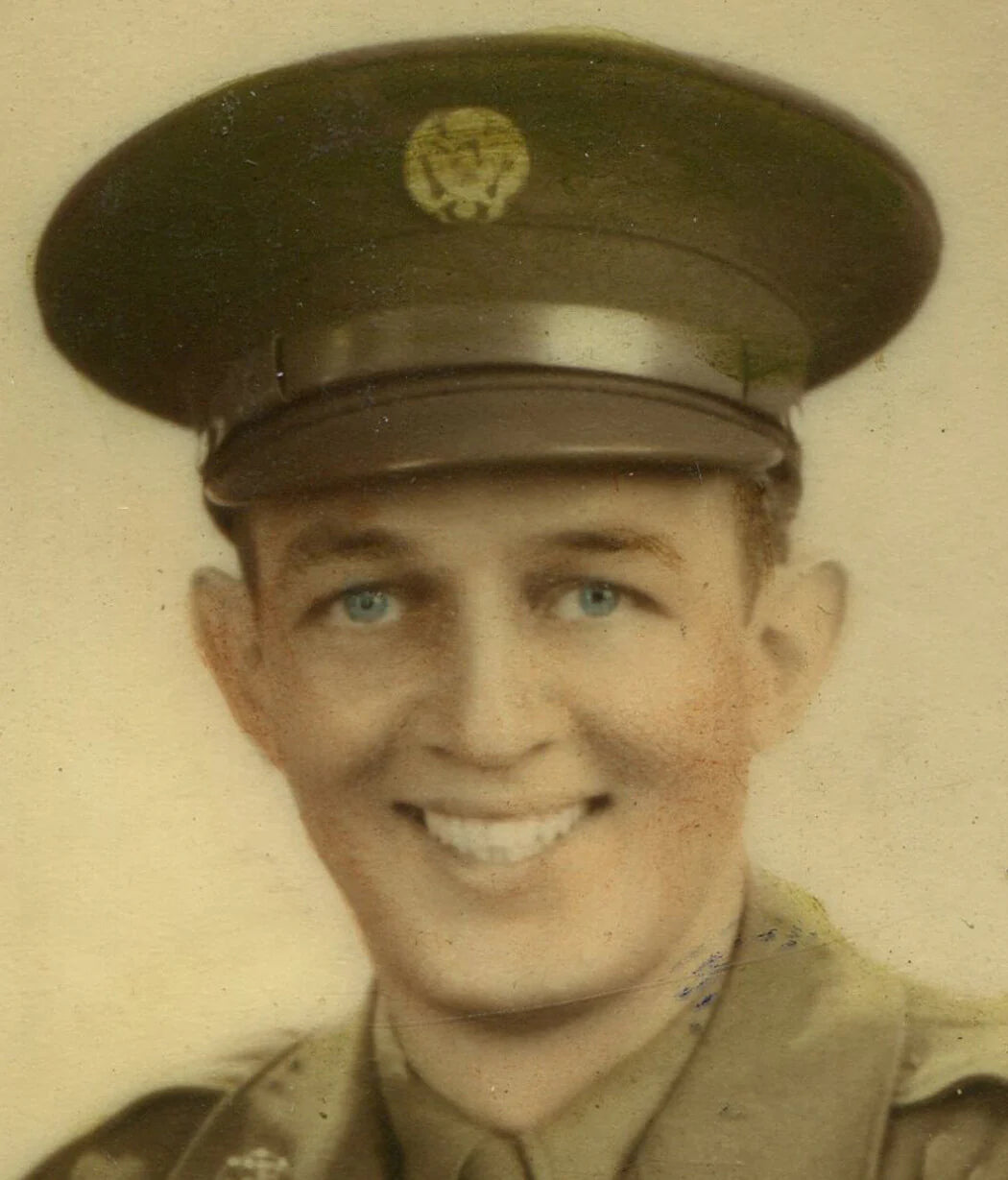 WWII SOLDIER IN UNIFORM. TINTED PHOTO BY GIMBELS PITTSBURGH, PA.
