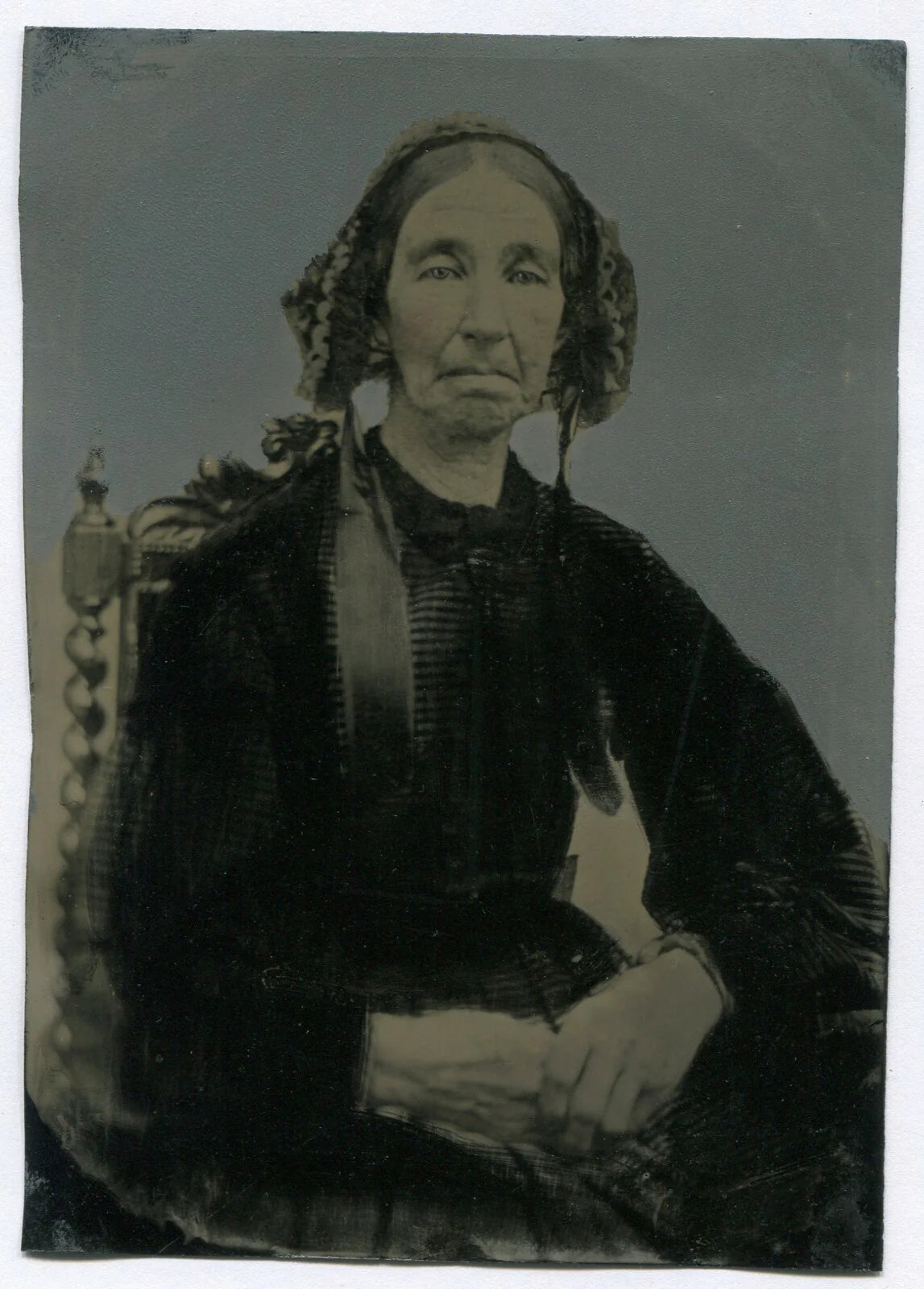 FOLK ART TINTYPE. PAINTED/TINTED PHOTO OF WOMAN IN BONNET. 5 X 7 IN.