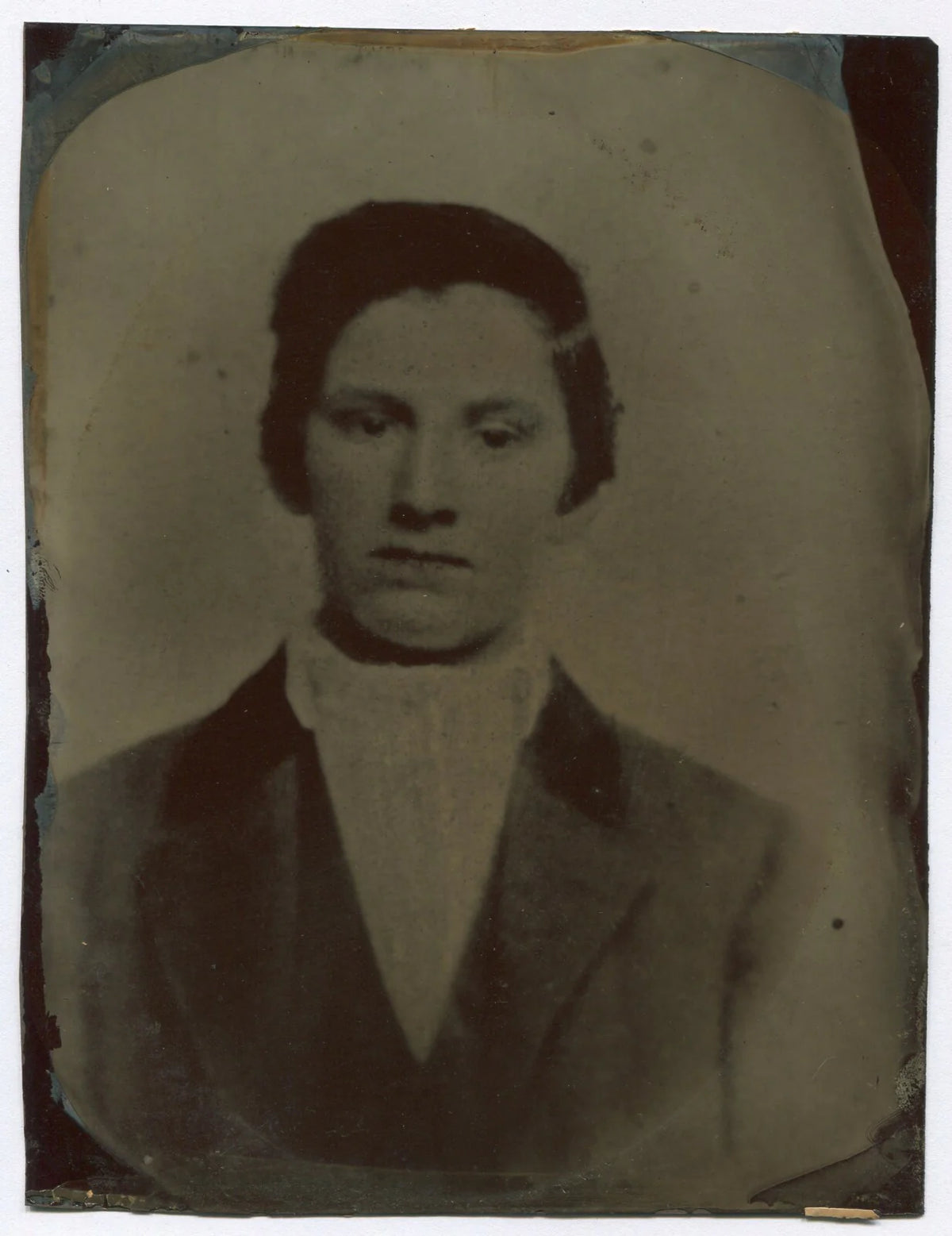 YOUNG MAN, SAD BLANK STARE. TINTYPE 8.5X6.5 IN.
