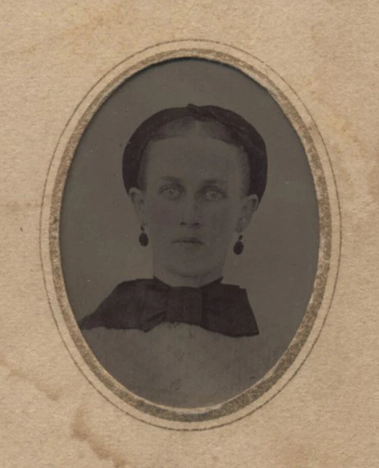 PORTRAIT OF WOMAN W/ STUNNING LIGHT EYES EARRINGS