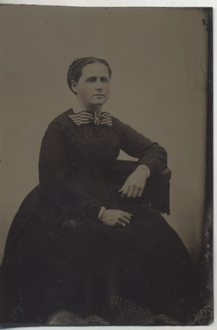 TINTYPE PORTRAIT OF WOMAN IN DRESS W/ LARGE STRIPED RIBBON