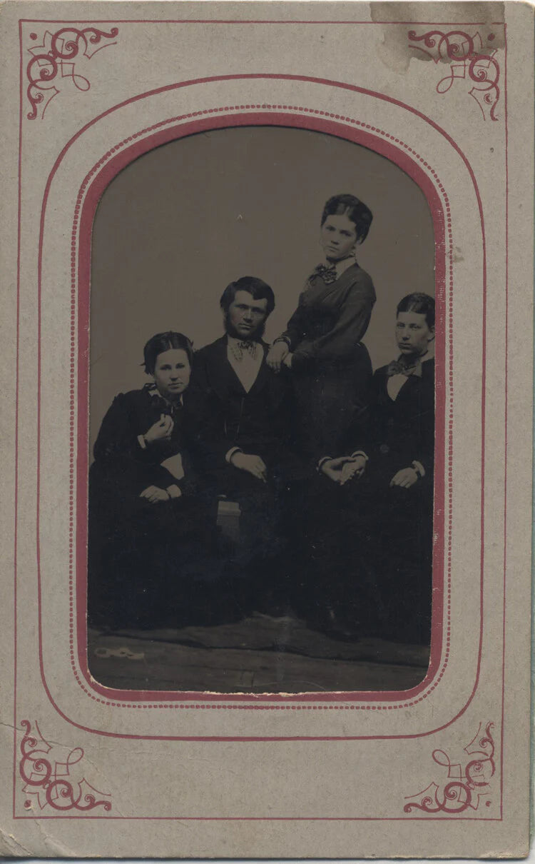 PORTRAIT OF WELL-DRESSED MAN W/ WIFE AND TWO DAUGHTERS