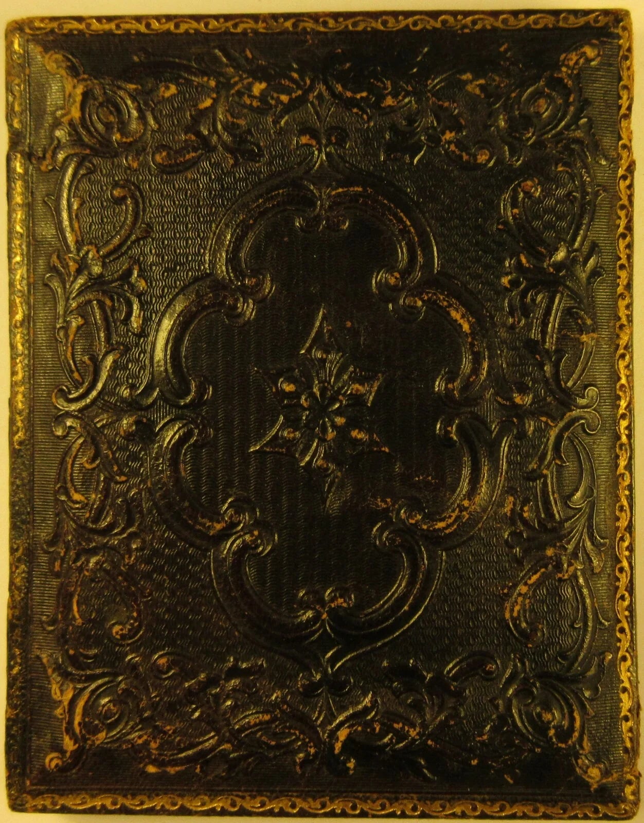 MAN W/SOUL PATCH. RICHLY TINTED 4TH PLATE AMBROTYPE. HALF CASE.