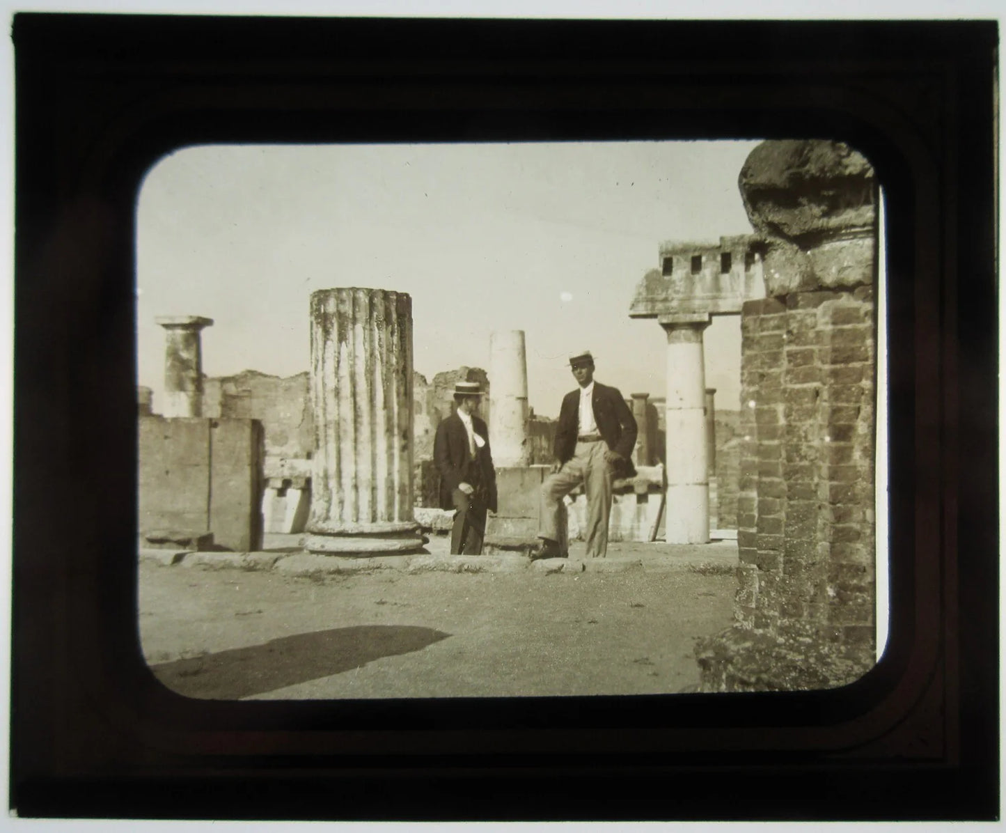 MEN POSED AMONG ROMAN RUINS. ITALY. PHOTO ON GLASS.