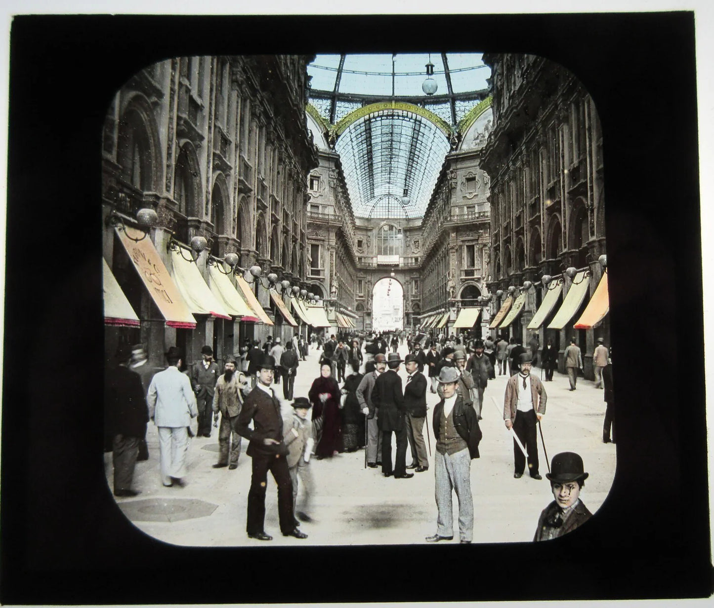 GALLERIA VITTORIO EMANUELE II, MILAN, ITALY. HAND COLORED PHOTO ON GLASS.