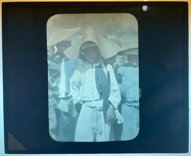 COLOR PHOTO ON GLASS OF ASIAN PEOPLE IN BEAUTIFUL TRADITIONAL HATS