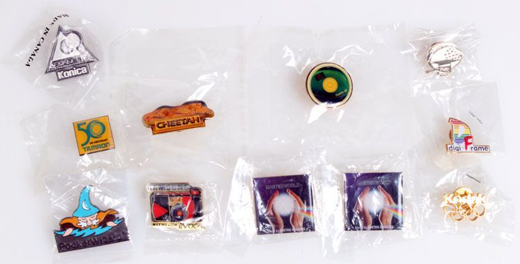 PHOTOGRAPHIC PIN COLLECTION OF 11