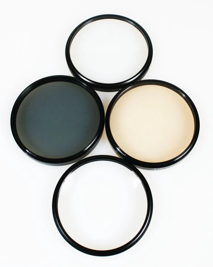 SET OF 4 67MM FILTERS: CLOSE-UP +4, UV, CIRCULAR POLA, AND 81B